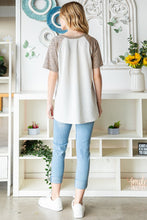 Load image into Gallery viewer, Heimish Full Size Animal Print Half Button Short Sleeve Top