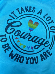 Courage PRIDE graphic tee on blue