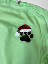 Load image into Gallery viewer, Paw print with santa hat graphic tee
