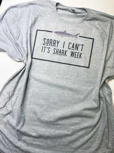 Sorry I can't-- its SHARK WEEK graphic tee!