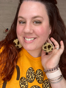 Natural animal pom pom earrings