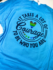 Courage PRIDE graphic tee on blue