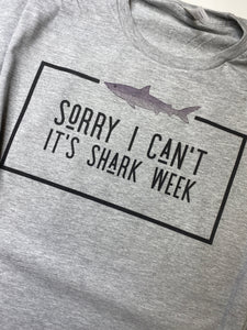 Sorry I can't-- its SHARK WEEK graphic tee!