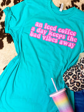 Load image into Gallery viewer, ICED COFFEE keeps the bad vibes away! graphic tee
